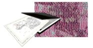 Eine analoge Karte wird in einem Scanner Digitalisiert.