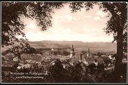 Alte nachgeblichene Postkarte mit einem Dorf als Motiv