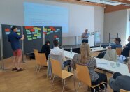 DigiMilch-Mitarbeiter präsentiert Ergebnisse des Workshops.